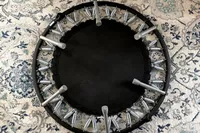 The Needak Soft-Bounce Folding Rebounder with the legs folded in