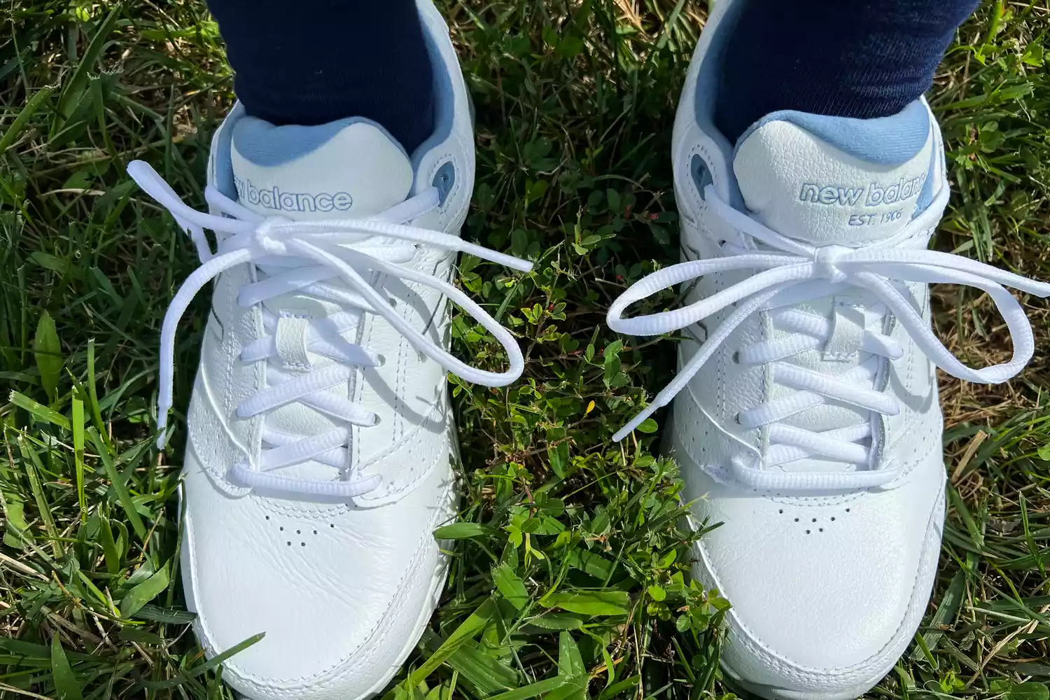 An overhead view of the New Balance Women’s 928v3 Walking Shoes in grass