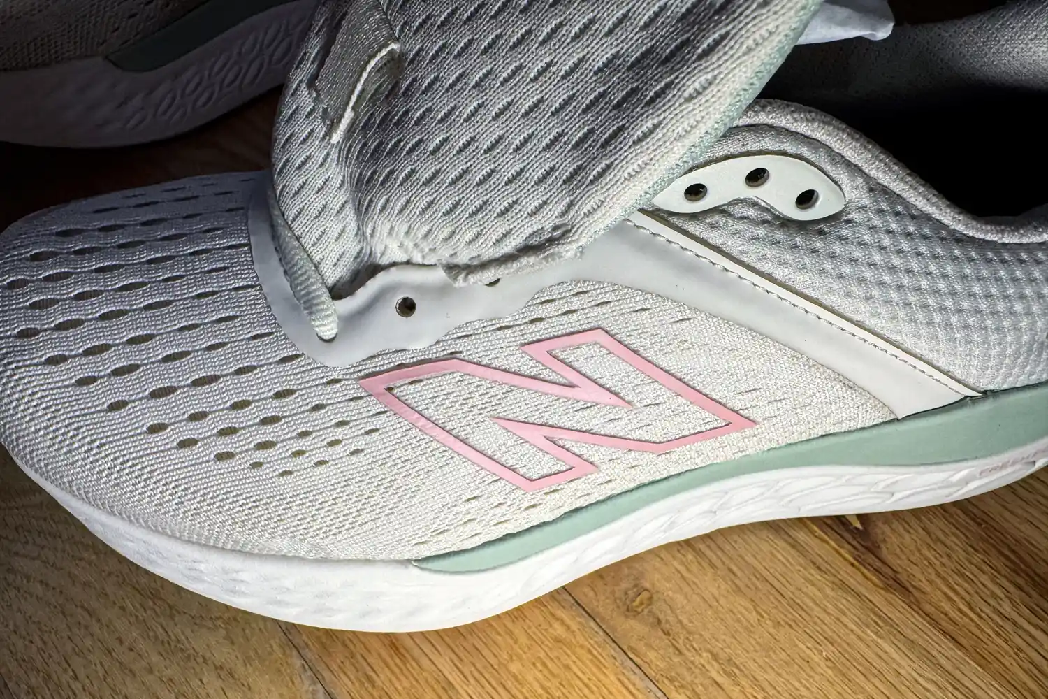 The brand logo printed on the New Balance Women's Made in USA Fresh Foam X 1540v4 Running Shoe