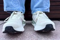 A front view of a person wearing the New Balance Women's Made in USA Fresh Foam X 1540v4 Running Shoes