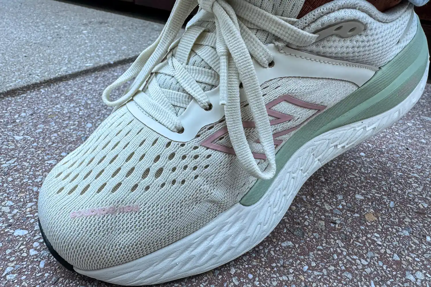 A side view of a person wearing the New Balance Women's Made in USA Fresh Foam X 1540v4 Running Shoes