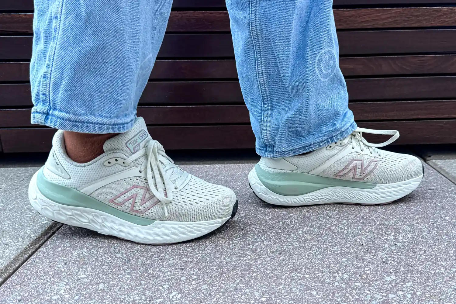 A side view of a person wearing the New Balance Women's Made in USA Fresh Foam X 1540v4 Running Shoes while she walks