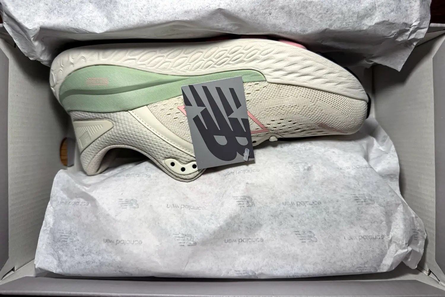 A pair of New Balance Women's Made in USA Fresh Foam X 1540v4 Running Shoes in a shoebox