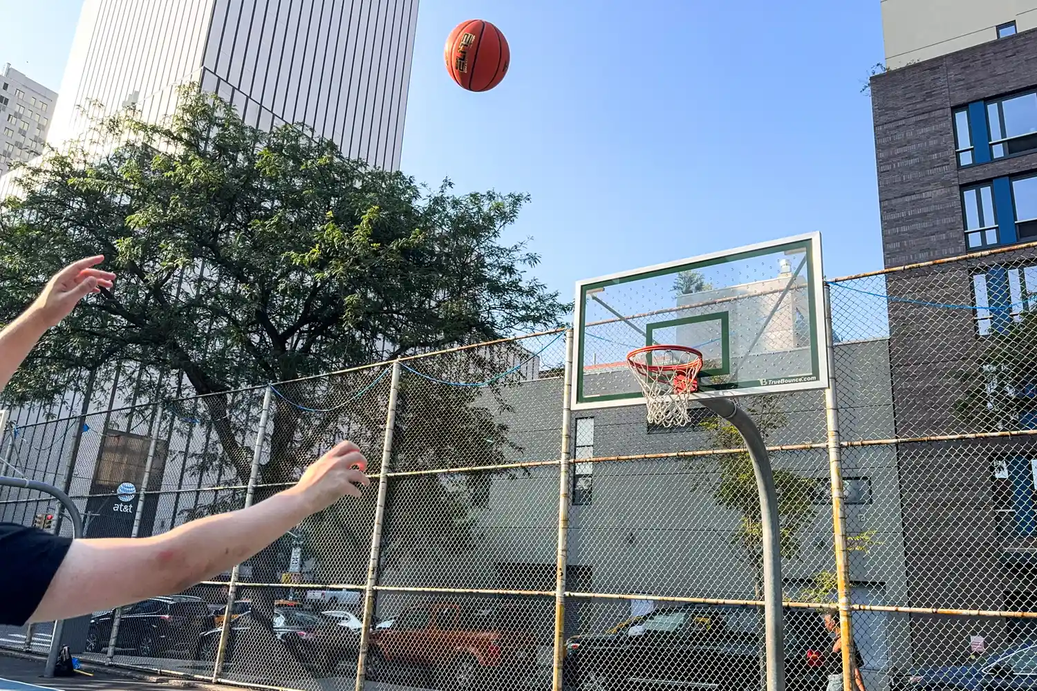 A person shoots the Nike Elite Championship Basketball