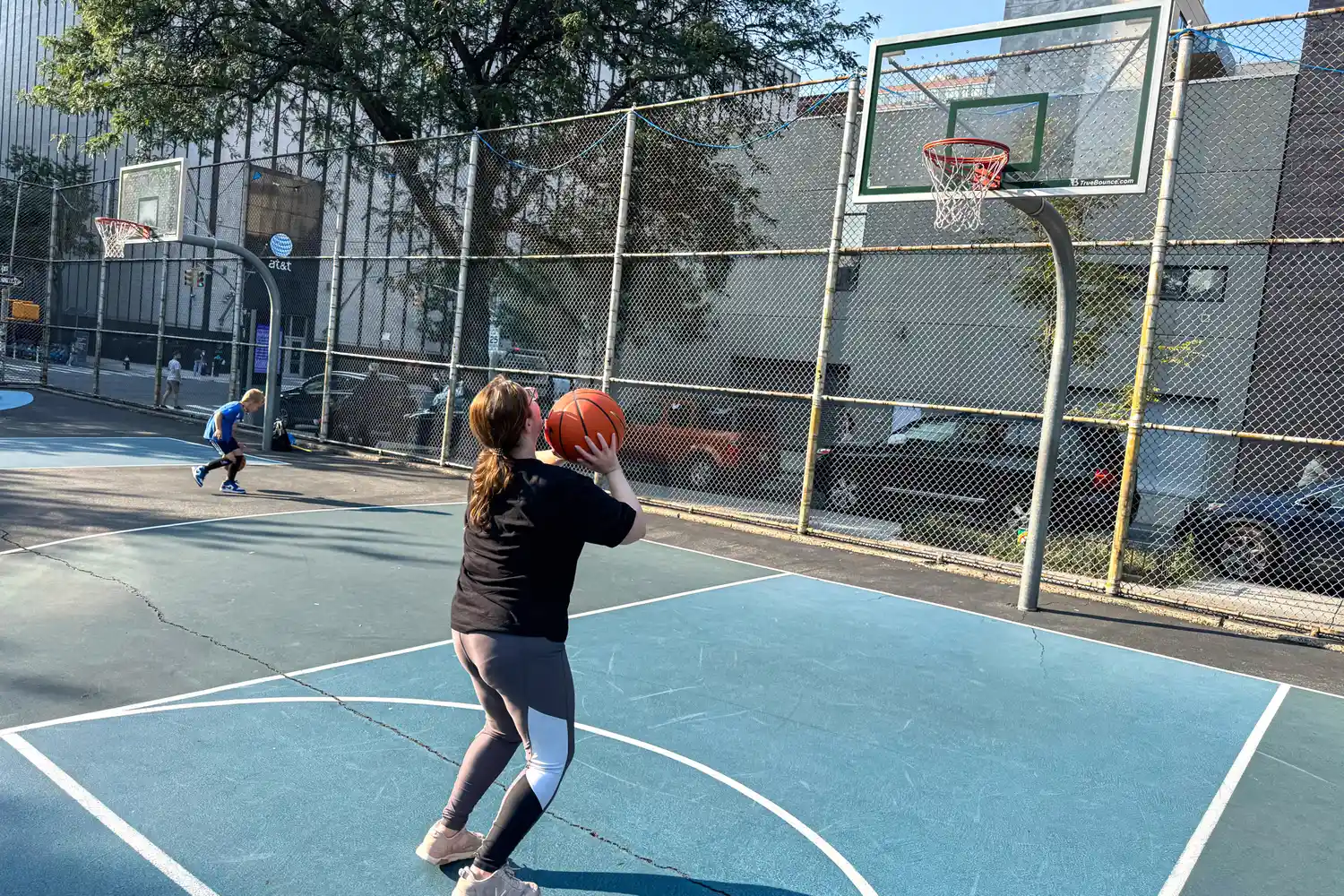 A person shoots the Nike Elite Championship Basketball