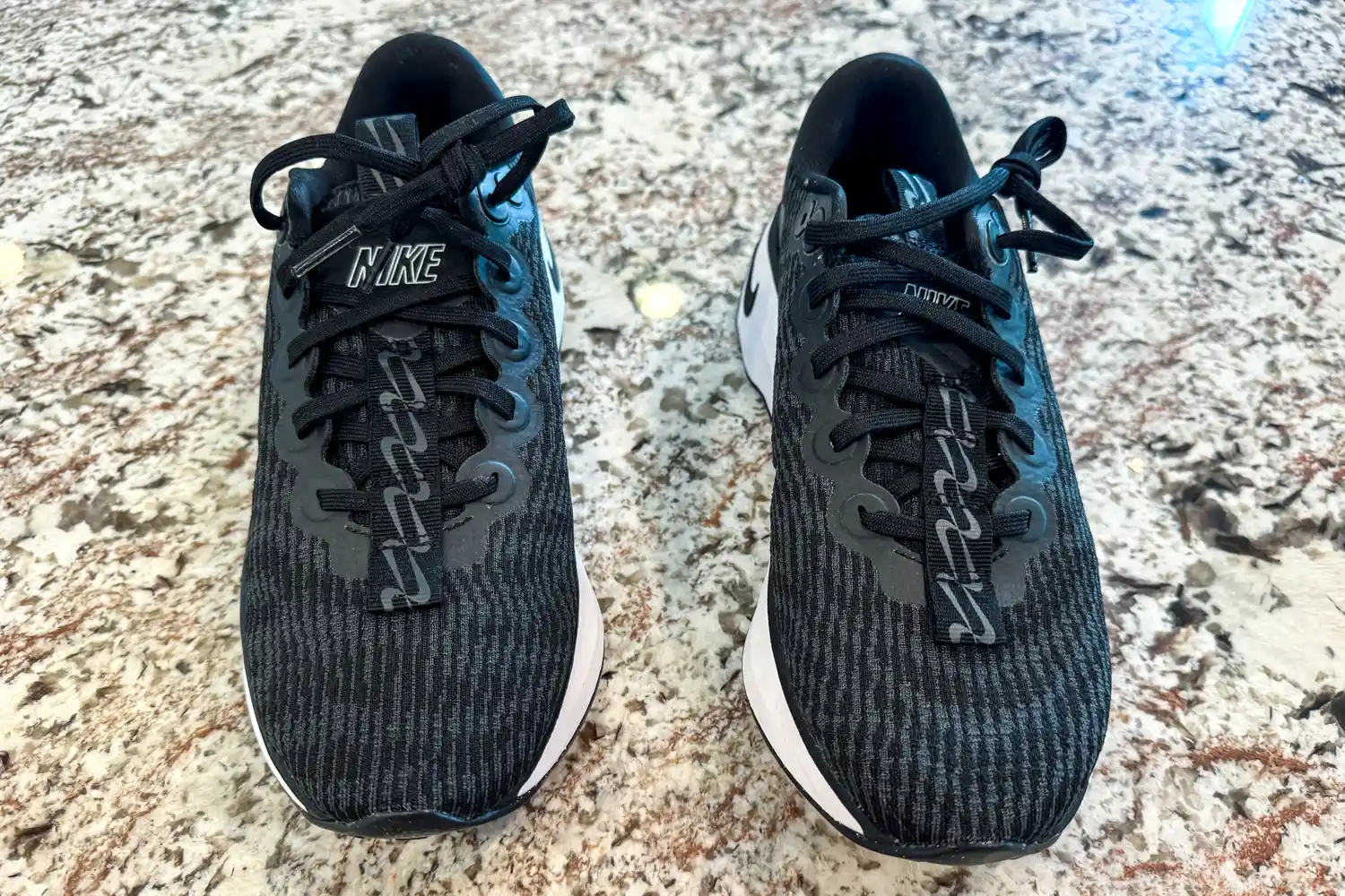 An overhead view of a pair of Nike Motiva Women's Walking Shoes