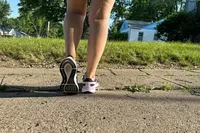 The bottom treads on a pair of Nike Structure 25 Women's Road Running Shoes