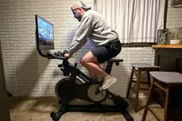 A person exercises on the NordicTrack X24 Bike
