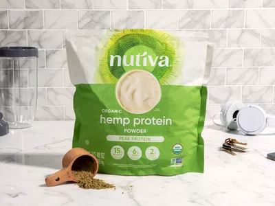 Nutiva Hemp Protein Powder On Marble Countertop