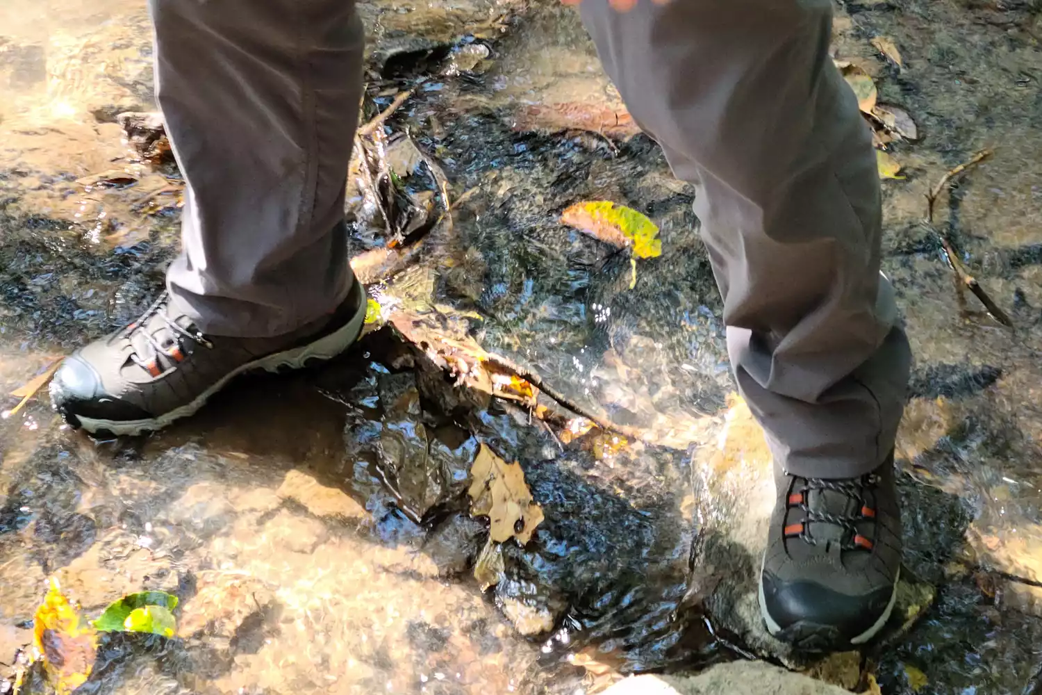 Feet standing in shallow creek while wearing Oboz Bridger 9 Inch Insulated Waterproof Hiking Boot
