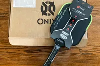 The Onix Hype X Pro Raw Carbon Pickleball Paddle in paper packaging
