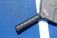 The handle on the Onix Hype X Pro Raw Carbon Pickleball Paddle