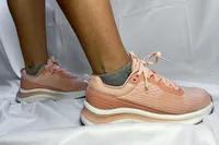 A person wears the Orthofeet Women's Relay Sneakers
