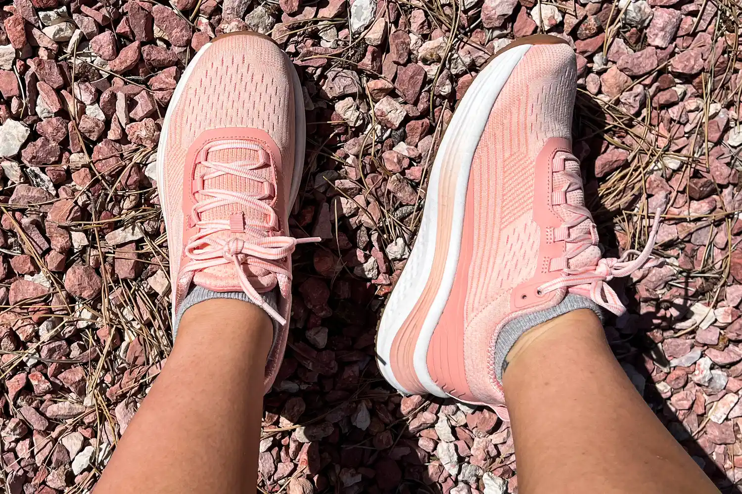 An overhead and side view of a person wearing the Orthofeet Women's Relay Sneakers