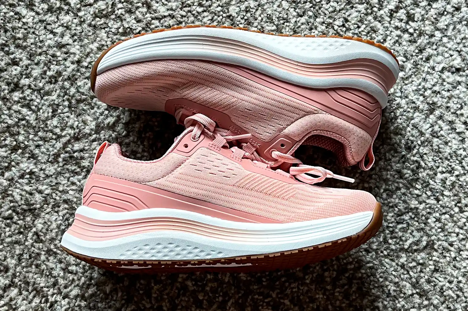 A pair of Orthofeet Women's Relay Sneakers showing the thickness of the sole