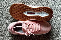 The treads on the bottom and the laces on the top of a pair of Orthofeet Women's Relay Sneakers