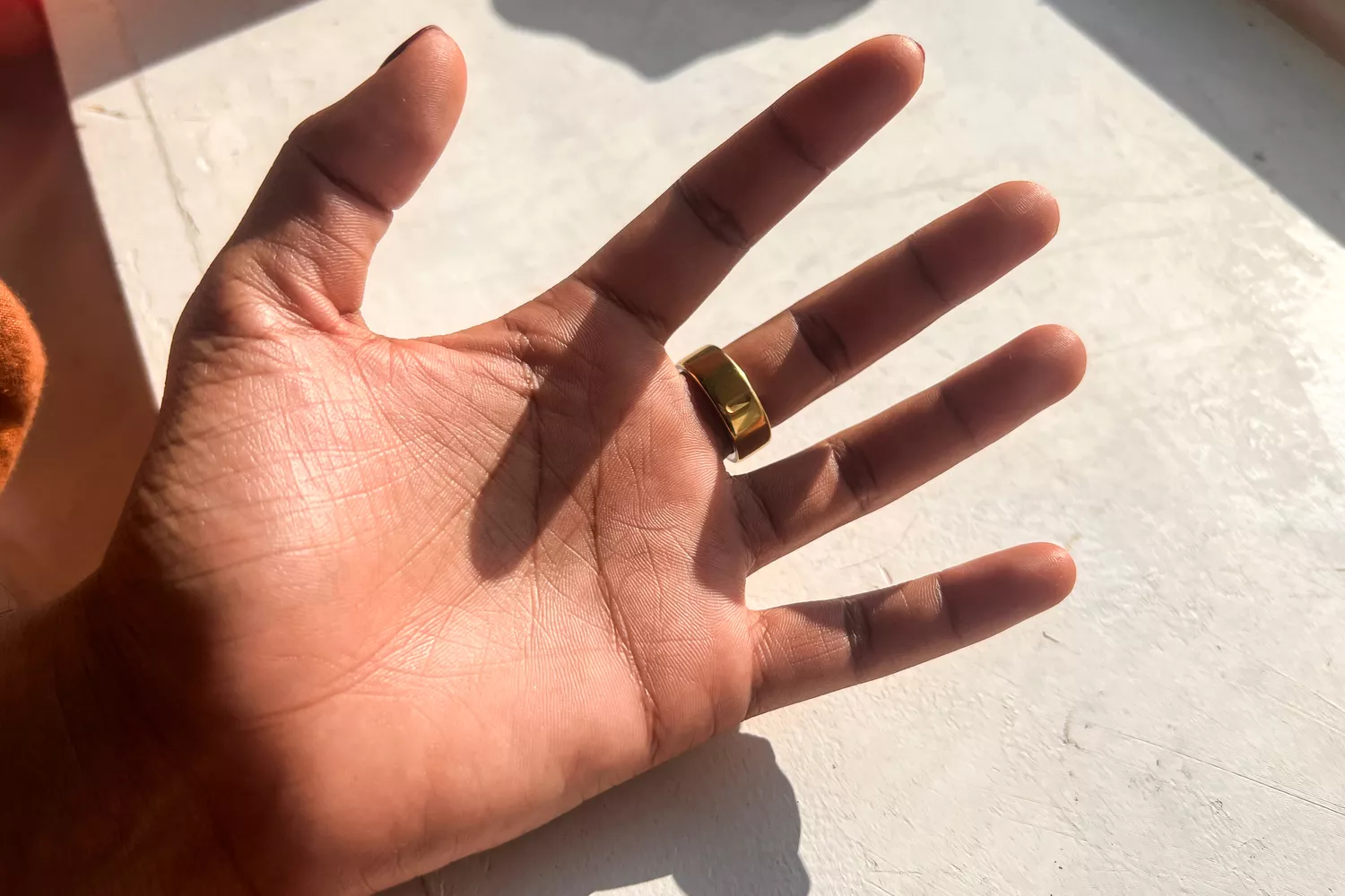 A person wears the Oura Ring 4