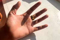 A person wears the Oura Ring 4