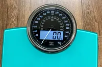 The digital and analog display on the Ozeri Rev 400 lbs Bathroom Scale