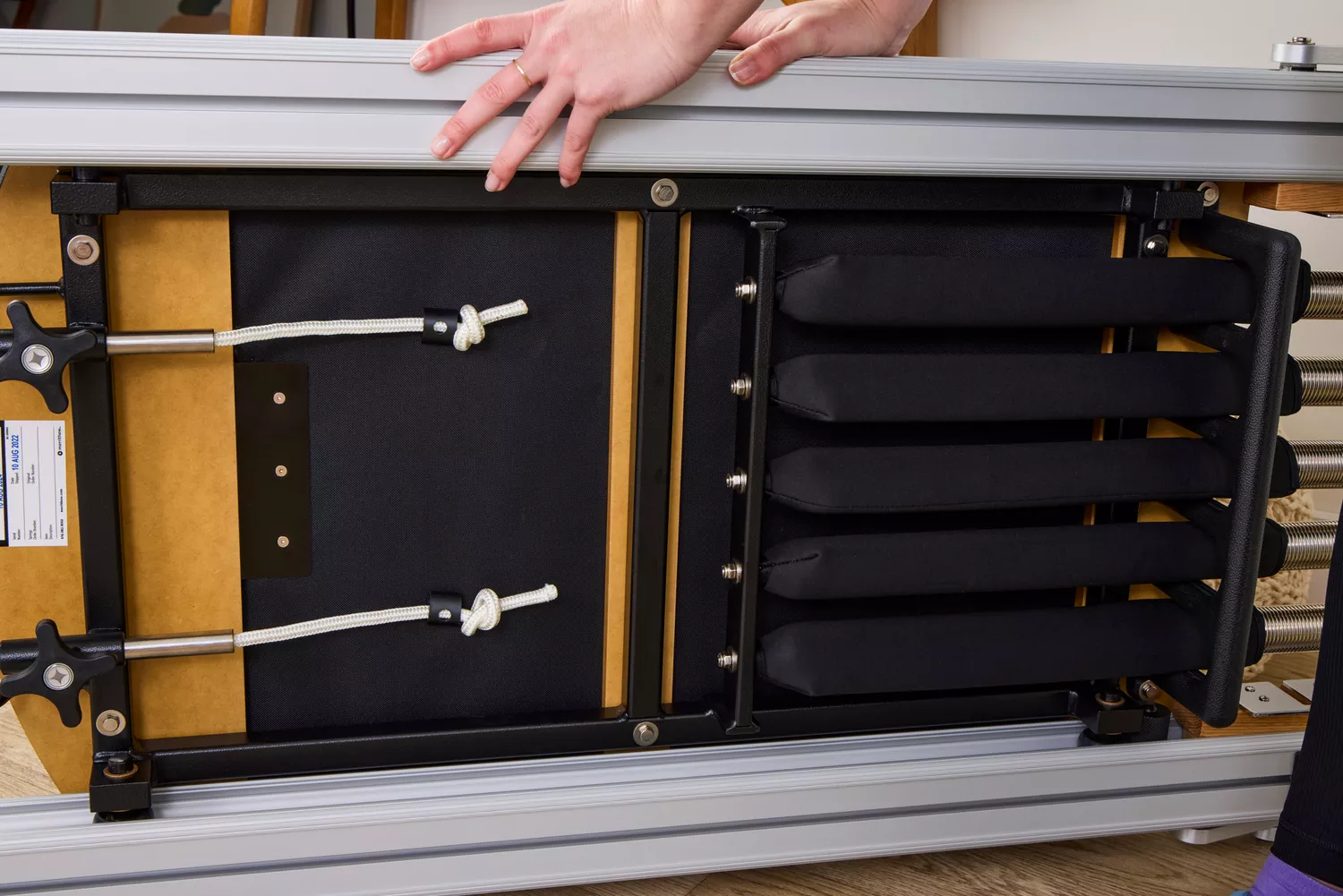 The underside of the Merrithew At Home SPX Reformer Bundle