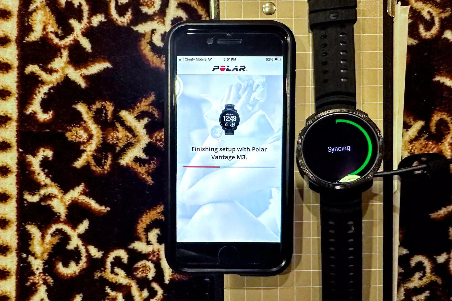 The Polar Vantage M3 Smart Multi-Sport Watch is paired with a smartphone