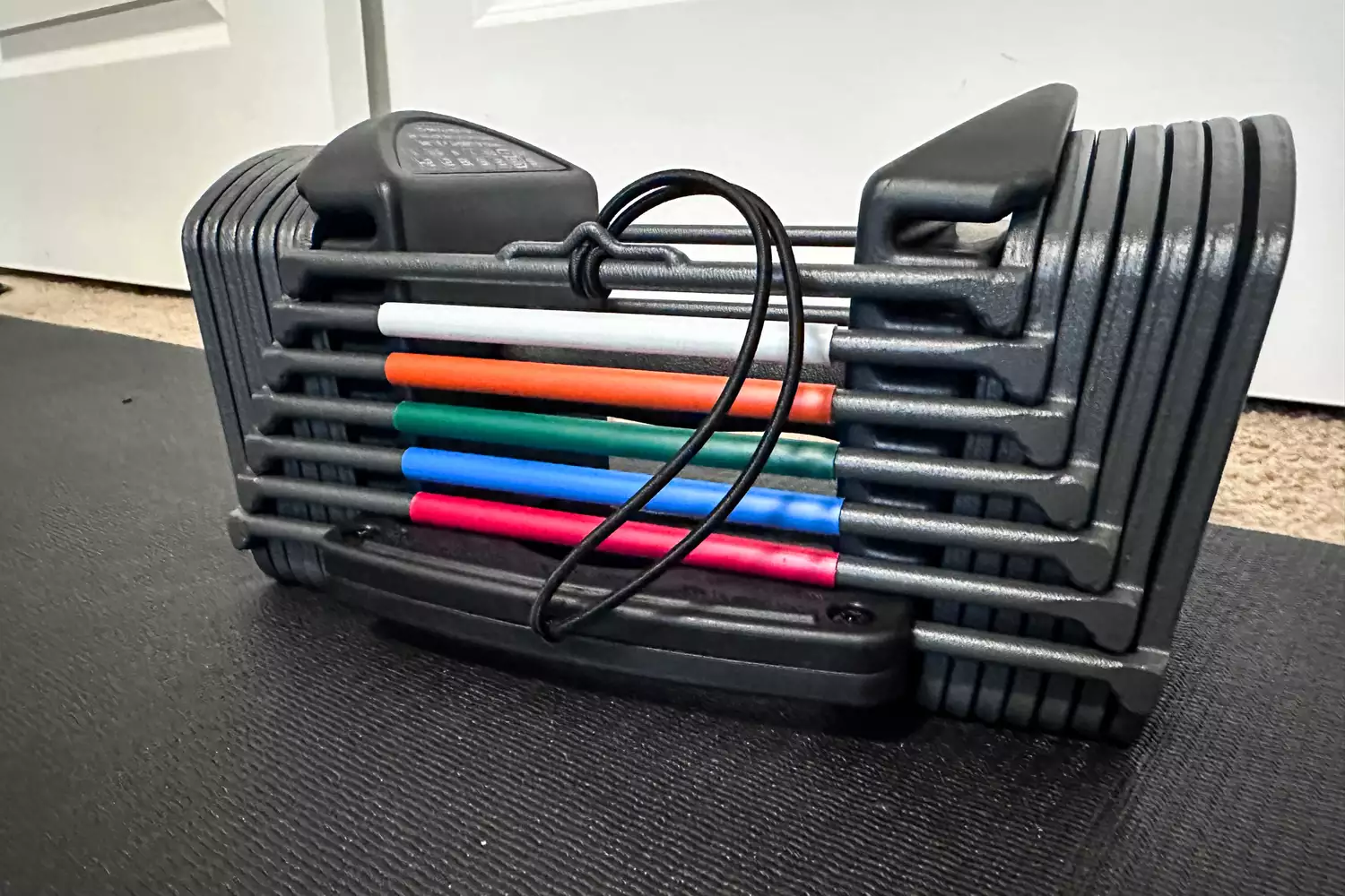 The different weights on the POWERBLOCK Sport 24 Adjustable Dumbbell