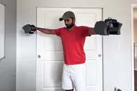 A person lifts up the POWERBLOCK Sport 24 Adjustable Dumbbell