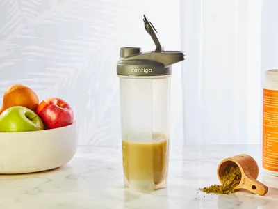 Contigo Shake & Go Thermalock Bottle displayed with smoothie, scoop, and fruit
