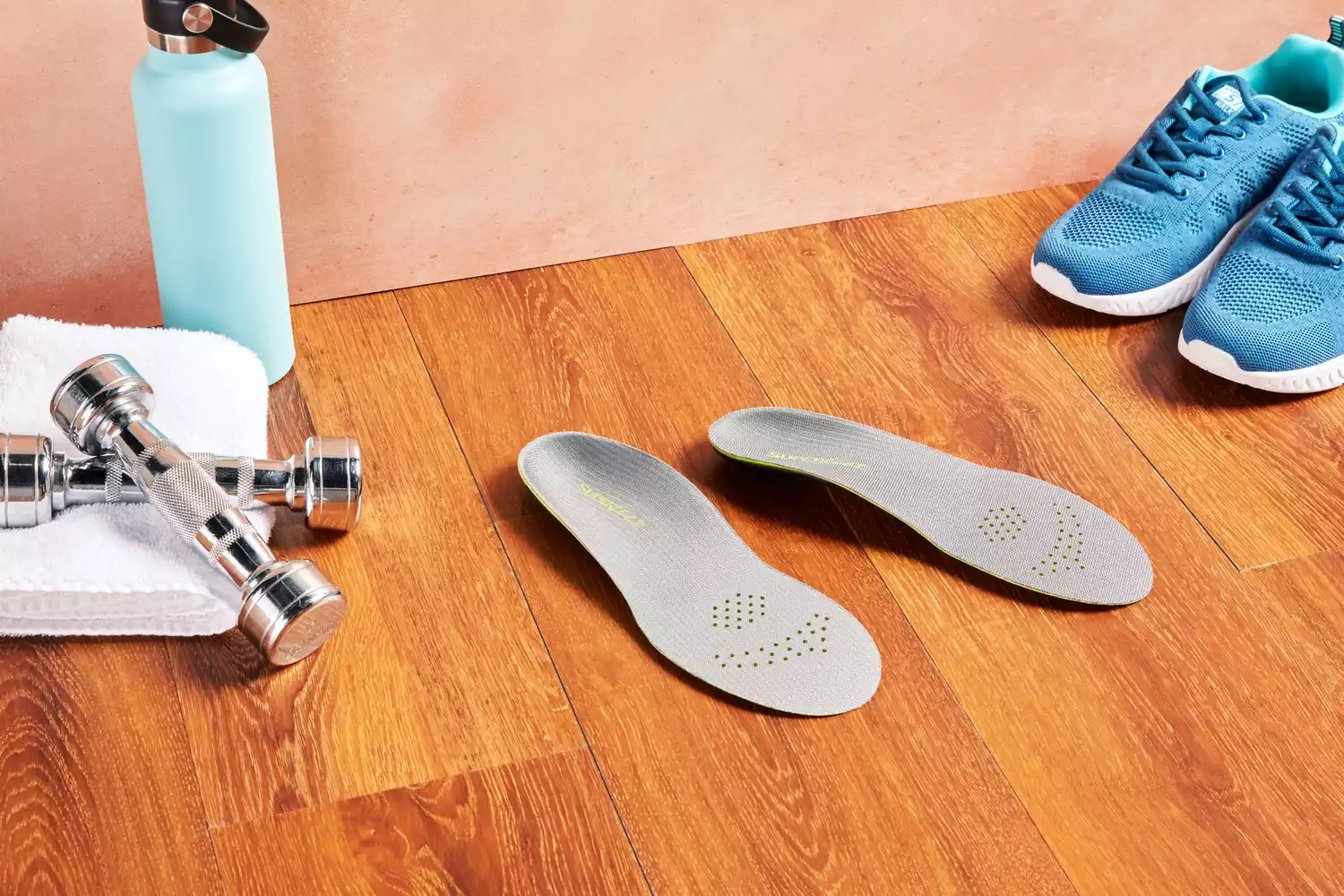 Superfeet Run Support Low Arch Shoe Inserts displayed on a wood floor