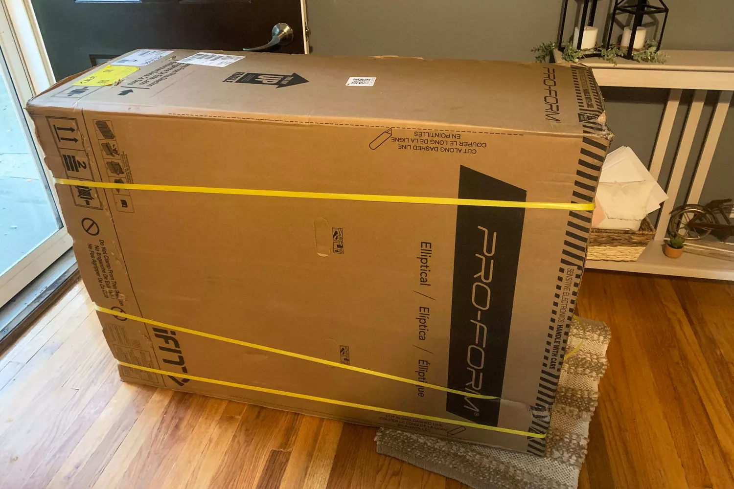 The ProForm Cardio HIIT H14 Trainer in a cardboard box