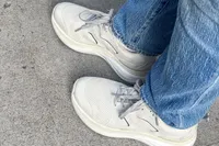 A person wears the Propét DuroCloud 392 Women's Sneakers