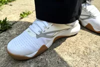 A close-up of the Reebok Nano Court worn on concrete