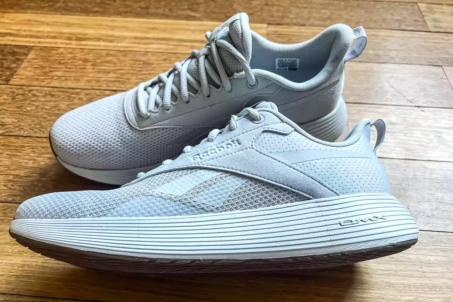 The logo on the side of the Reebok Unisex DMX Comfort+ Walking Shoes