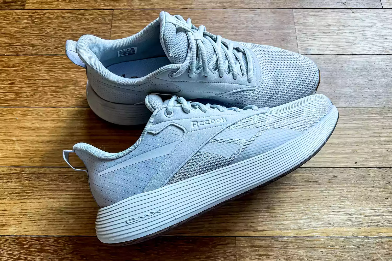 A side view of the Reebok Unisex DMX Comfort+ Walking Shoes