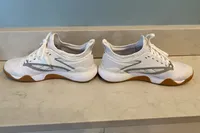 A side view of a pair of Reebok Women's Nano Court Shoes