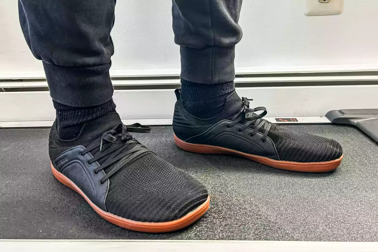 A person wears the Relxfeet Men's Minimalist Barefoot Shoes