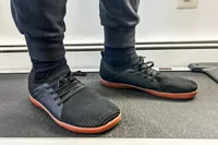 A person wears the Relxfeet Men's Minimalist Barefoot Shoes