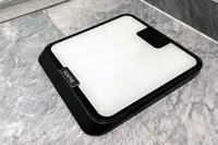 The Renpho R-MSB02 Elis Chroma Aspire Smart Scale on a tile floor