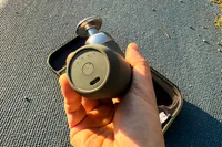 The charging port on the bottom of the Renpho Mini Thermal Massage Gun