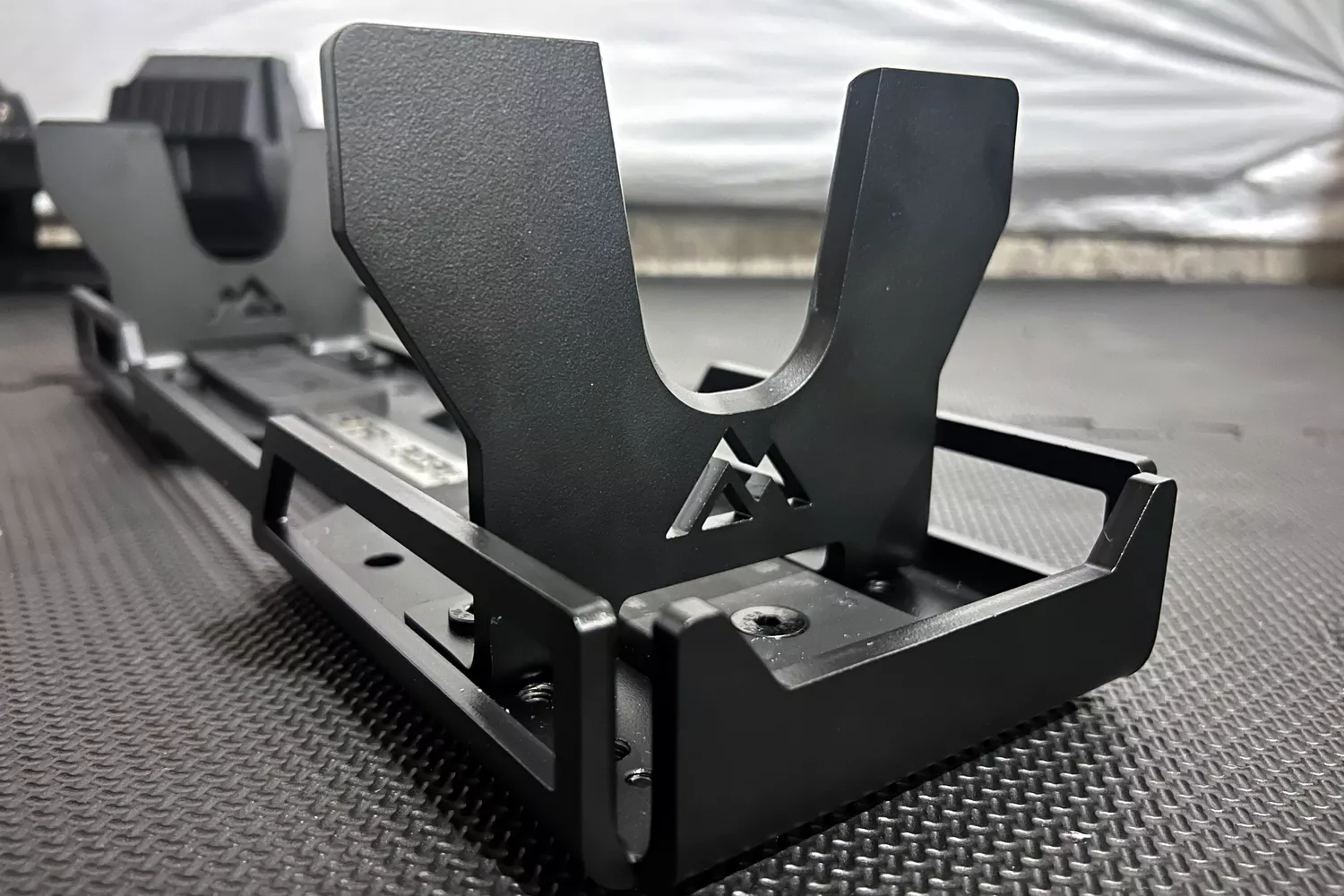 The base on the REP Fitness REP x PÉPIN FAST Series Adjustable Dumbbell