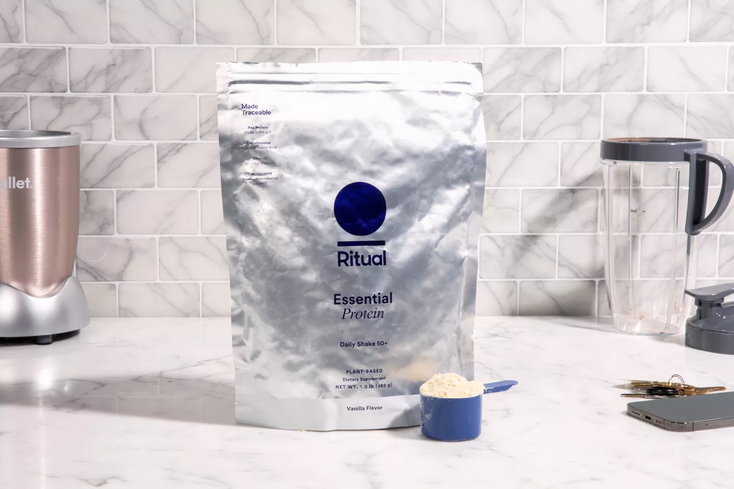 Ritual Essential Vegan Plant-Based Protein Powder on marble counter