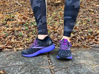 Person standing in Brooks Ghost 14 Running Shoes on sidewalk