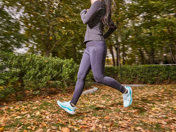 A person running outdoors wearing the Nike InfinityRN 4