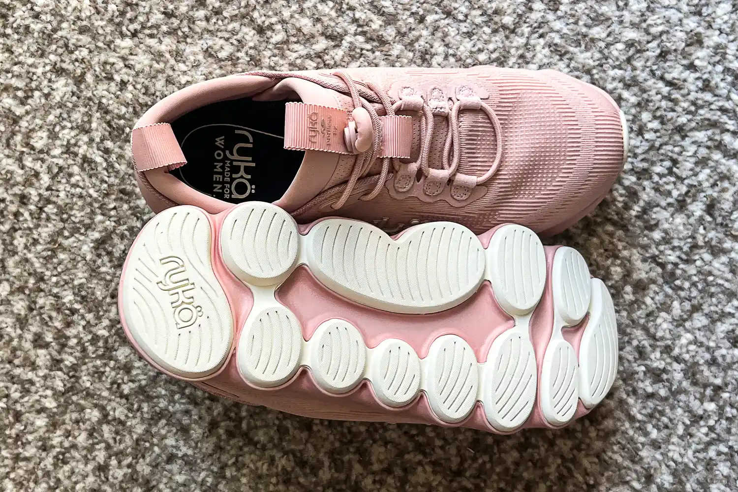 The laces and the treads on the bottom of the Rykä Women's Podflow EZ Walking Sneakers