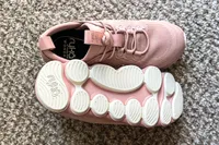 The laces and the treads on the bottom of the Rykä Women's Podflow EZ Walking Sneakers