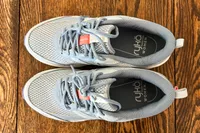 An overhead view of the Ryka Women's Invoke Walking Shoes on wood