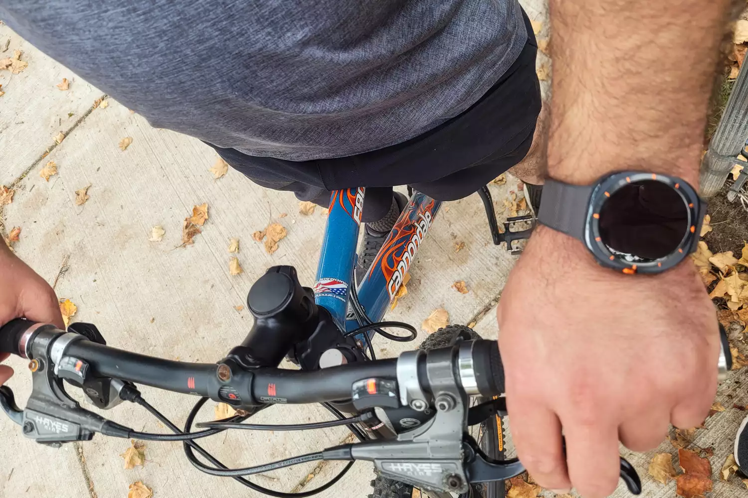 A person wears the Samsung Galaxy Watch Ultra while biking