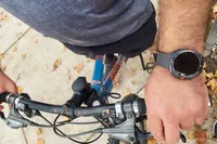 A person wears the Samsung Galaxy Watch Ultra while biking