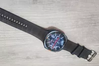 The Samsung Galaxy Watch Ultra on a wooden table