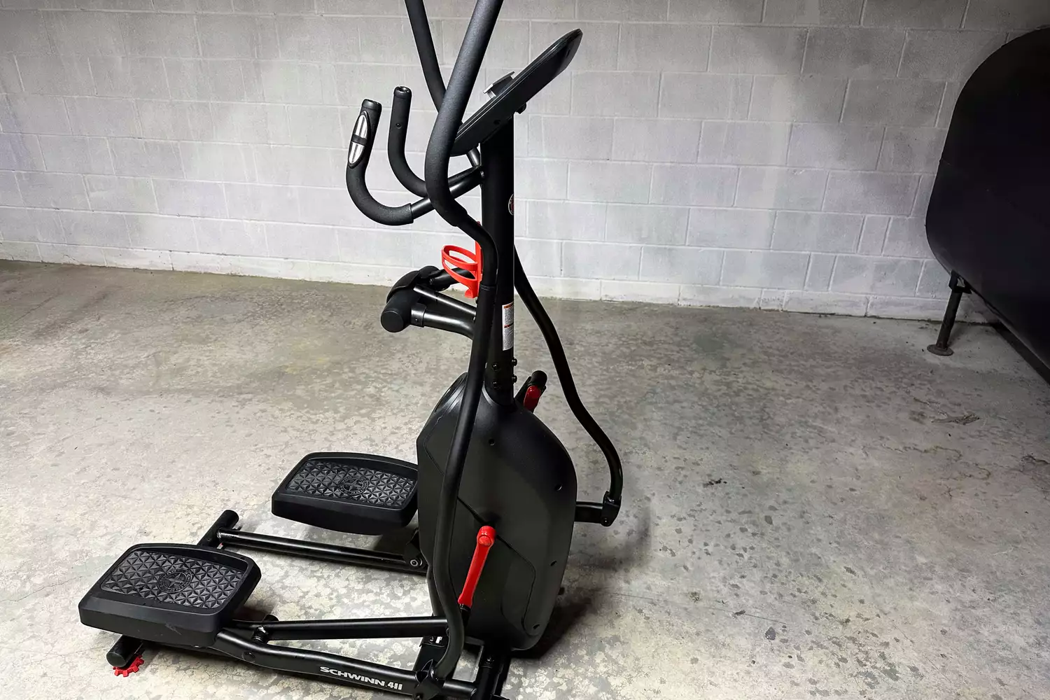 A side view of the Schwinn 411 Compact Elliptical Machine